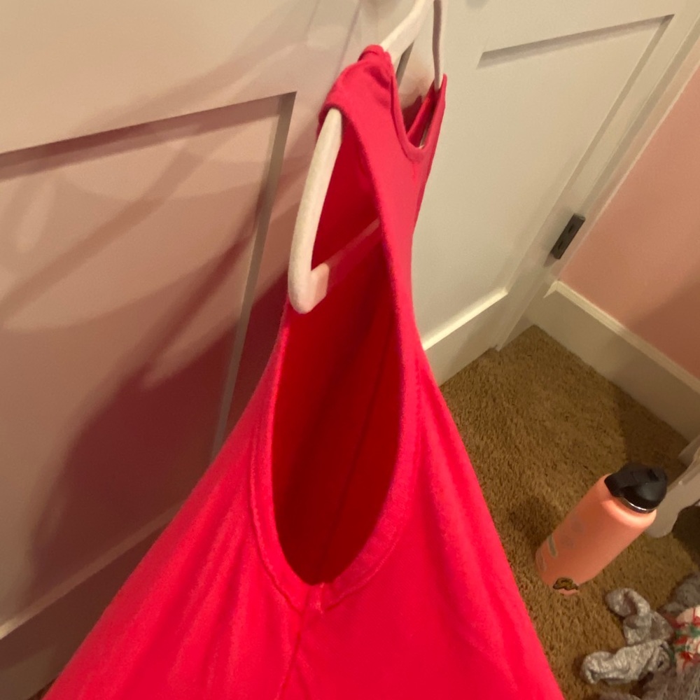 Pink t-shirt with half sleeves and open shoulder